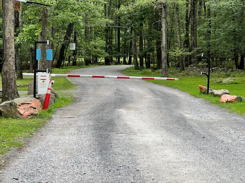 Gated entrance road into the community