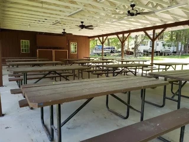 Covered pavilion interior with picnic tables